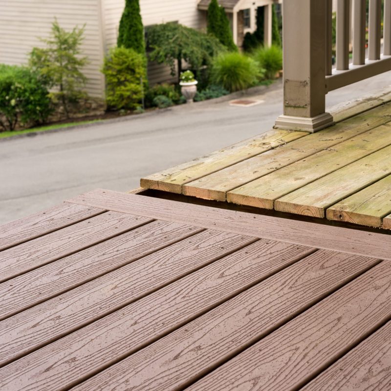 Repair and replacement of an old wooden deck or patio with modern composite plastic material